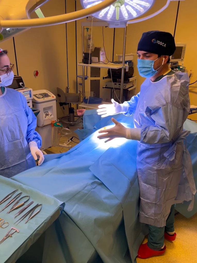 Assoc. Prof. Dr. Tuncay Tas in the operating room in Istanbul, where he performs microsurgical vasectomy reversal
